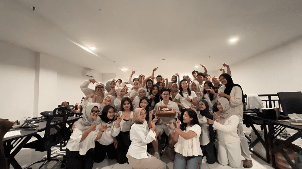 The ENTROPI Jakarta team celebrating in the office